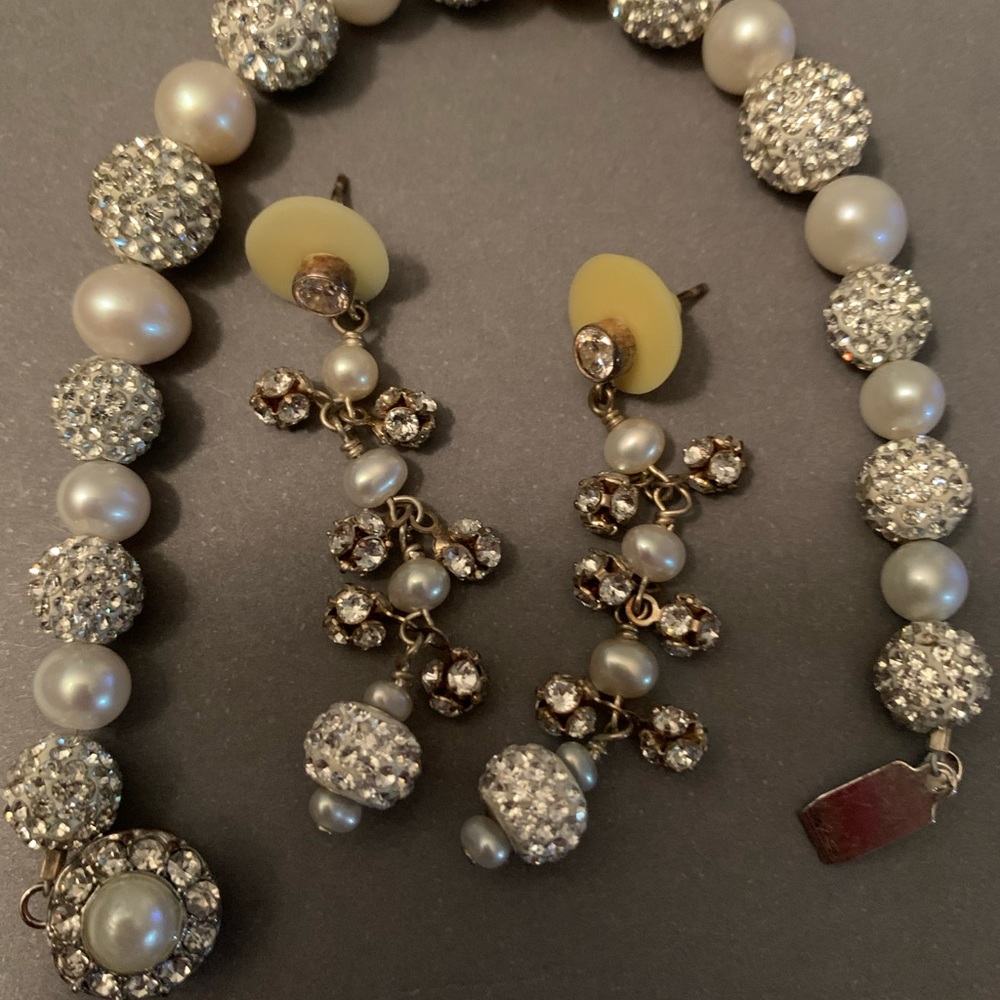 Swarovski crystal bracelet and matching earrings.